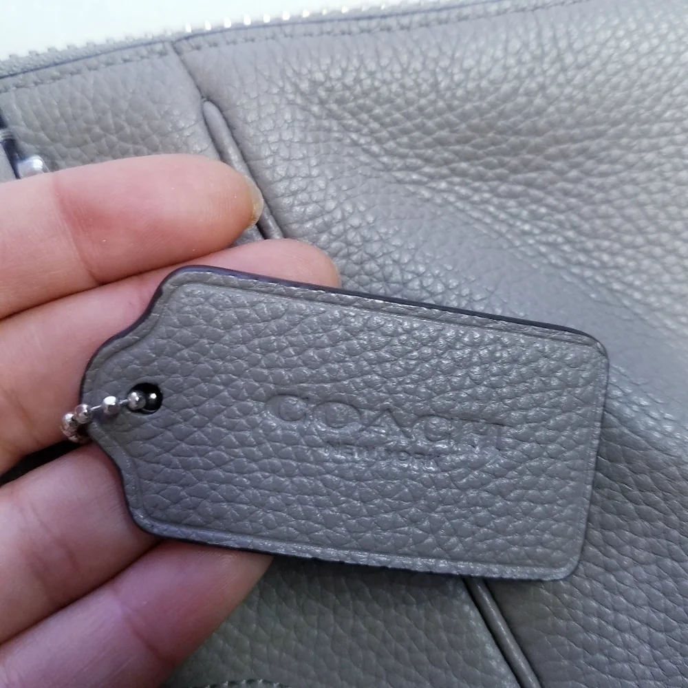 Coach excellent refer